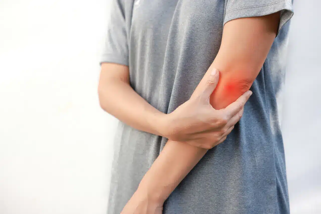 Woman suffering from arm tingling sensation